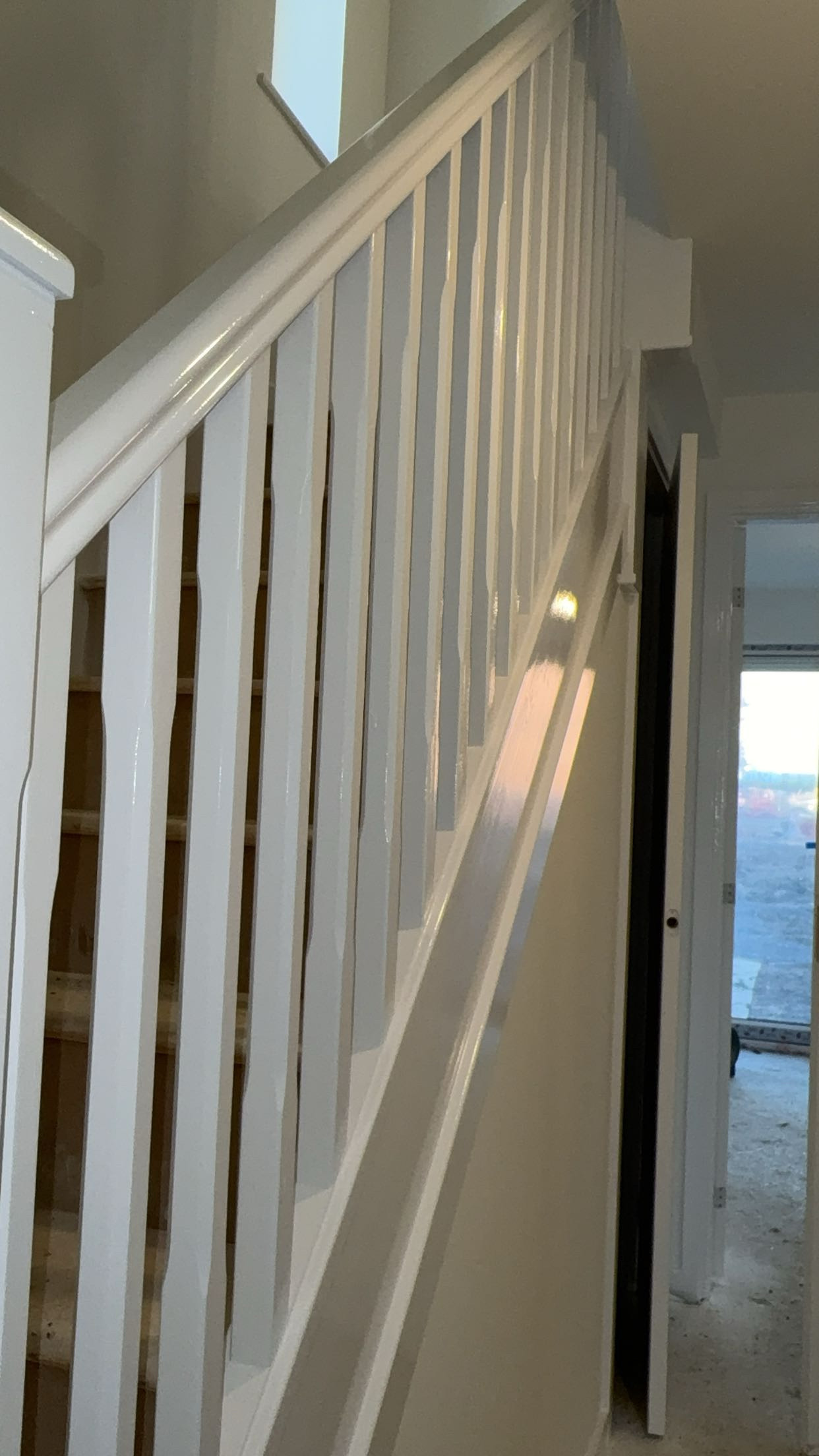 Finished white staircase and railings