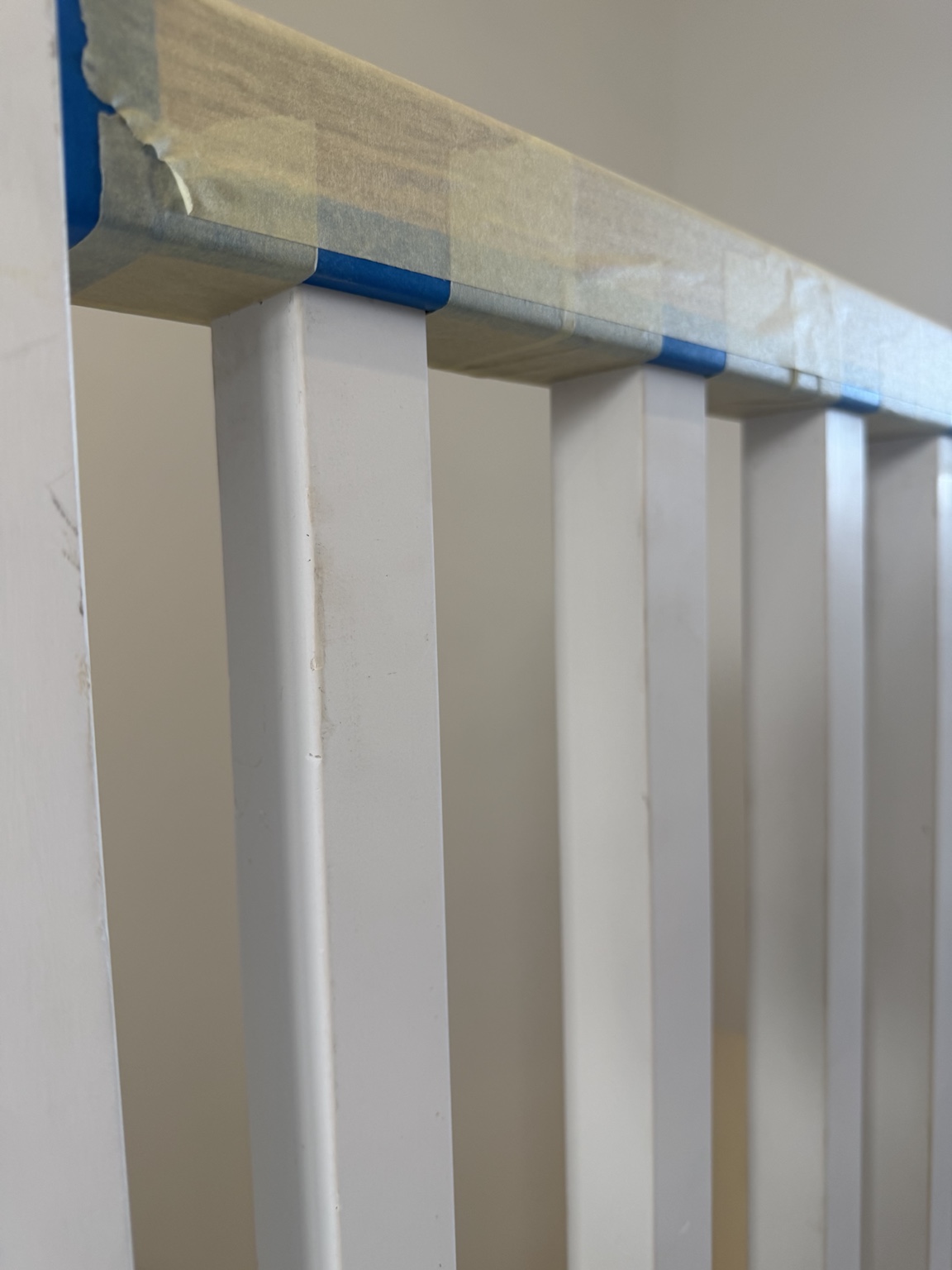 Masked staircase spindles during decorating